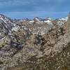 In the far distance (left to right) are most of the Kaweah Ridge - Red Kaweah, Black Kaweah, and Kaweah Queen.  They are seen above the Kern Kaweah River valley (center) where the Kern Kaweah River plunges down to meet the Kern River (hidden below).