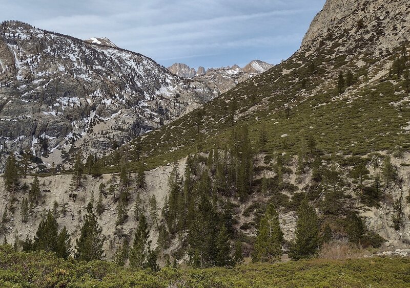 Above Kern Canyon (looking southwest) along Wallace Creek close to where it empties into the Kern River, Kern Canyon walls have shrunk dramatically, however the Kern River is still below, out of sight. Some of the Kaweahs are seen in the far distance.