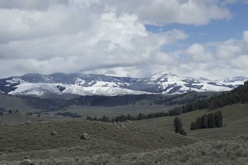 In the spring, snow caps the surrounding mountains. The views from the ridge line are amazing.