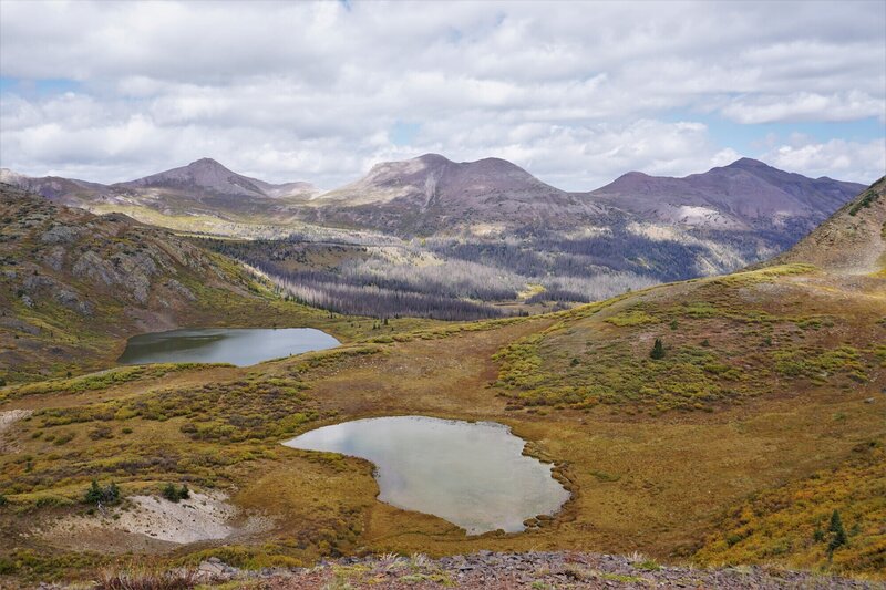 Looking down on a small pond and West Ute Lake from a saddle.