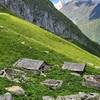 Abandoned shepherd hamlet? Cute stone huts in stunning valley.
