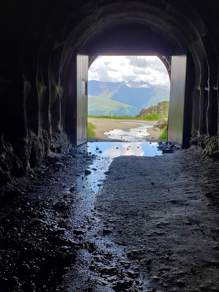 Popping out of the tunnel into the blinding alpine sunshine.