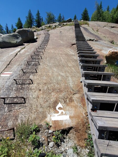 Examples of the old and newer methods of ascending the glacier-sculpted rock slabs.