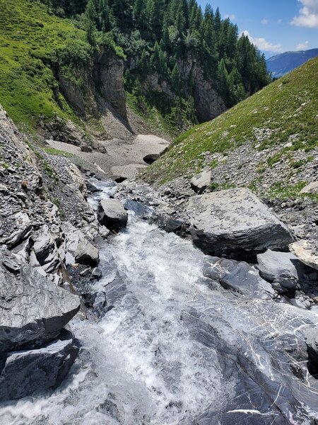 Lots of water rushing down this ravine - hikers will be thankful for the footbridge!