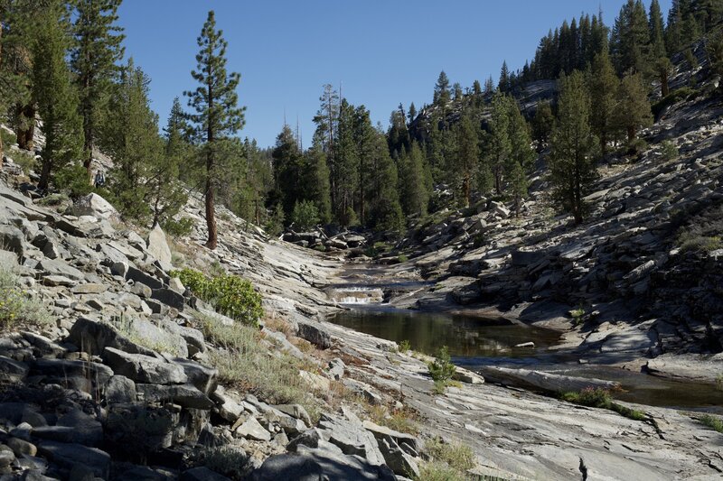 Yosemite Creek flows through polished granite as it makes its way through the forest.   Pools of water provide good opportunities for a nice dip, but not deep enough for swimming.