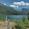 Canada/USA border - monuments and cutline showing to the east on the far side of Upper Waterton Lake.