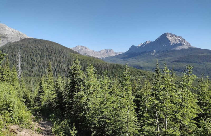 Gould Dome, 9,495 ft., is on the right. Funnel and Funnel N3 peaks are in the distance (center). Tornado Mountain and Tornado Saddle are hidden behind the ridge extending north-northwest from Gould Dome. Seen looking north.