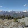 Sage Creek headwaters are in the valley below with gorgeous snowy peaks in the distance.  Seen looking southwest from high on the Great Divide on a perfect July day.