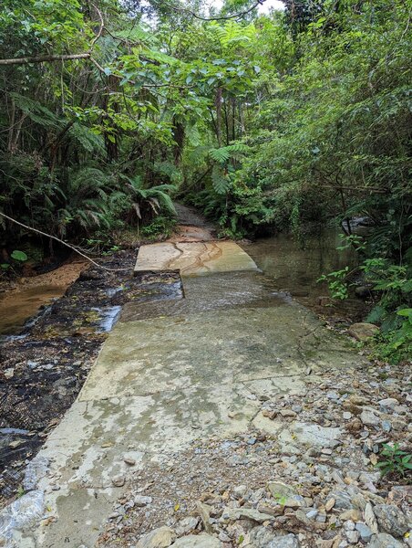 Cement river crossing.  Be careful as the moss and moving water can make it slippery.