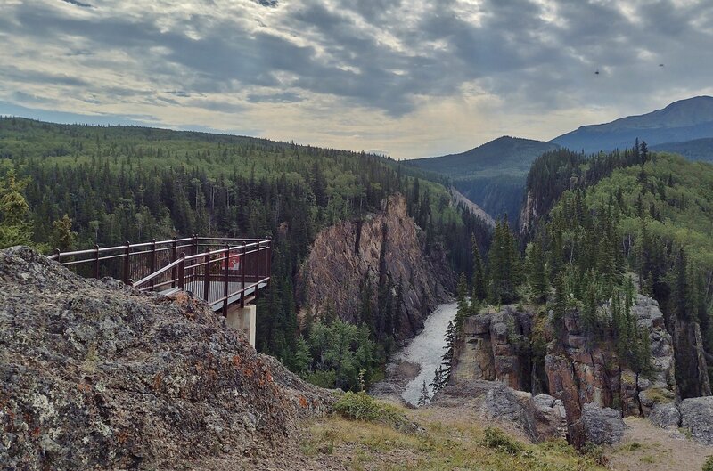 One of the viewing platforms along the Sulphur Gates Walk, overlooking the Sulphur River just before it empties into the Smoky River (not visible here) at the Sulphur Gates (cliffs).