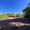 Stamp sands (mining remnants) easily viewable from trail.