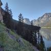 Rounding the base of a cliff, there are great views of Upper Green River Lake and the surrounding mountains.