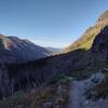 The view west-southwest down the Sprague Creek valley towards McDonald Lake in the early morning, from Gunsight Trail.