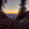 Last rays of light behind Lake McDonald, as another day ends at Sperry trail camp.