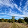 On the edge of the prairie on the east side of the loop.