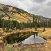 A lake along the Conundrum Out-And-Back Trail in Autumn.