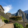 Entrance to Machu Picchu with Huayna Picchu Mountain looming above.