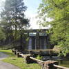 View of the bridge with the damn and spillway in the background.