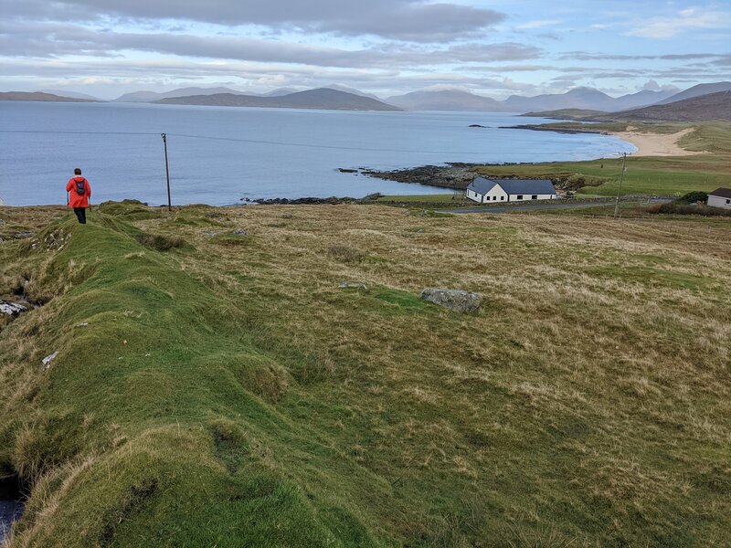 Walk toward the road on a VERY old field-edge rockpile, among outstanding views.