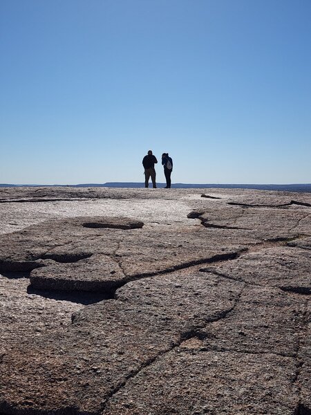 Couple on the summit of Enchanted Rock.