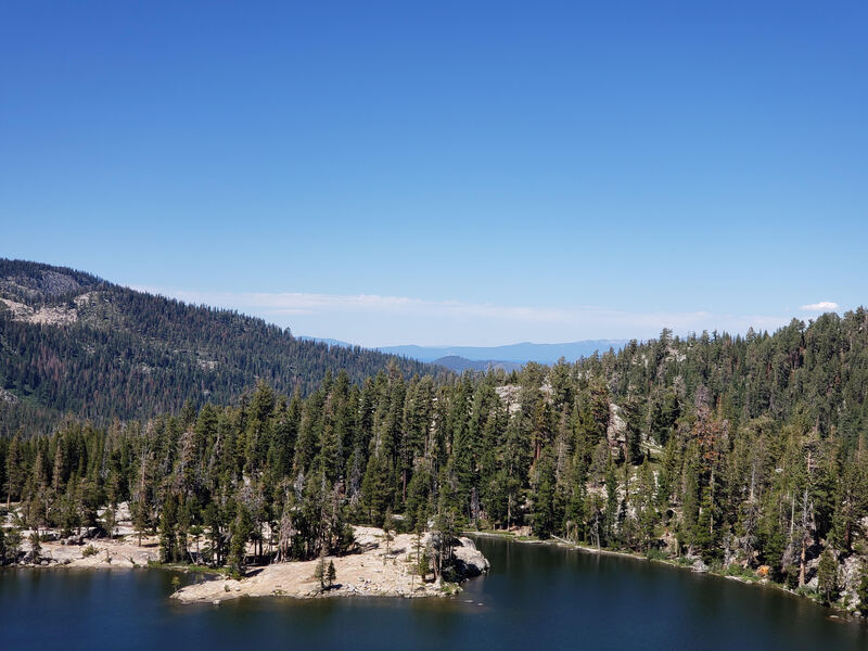 I scaled the rock face at the base of Dardanelles Lake, most of the way up. Very windy but amazing view. Can even see South Lake Tahoe deep in the background.