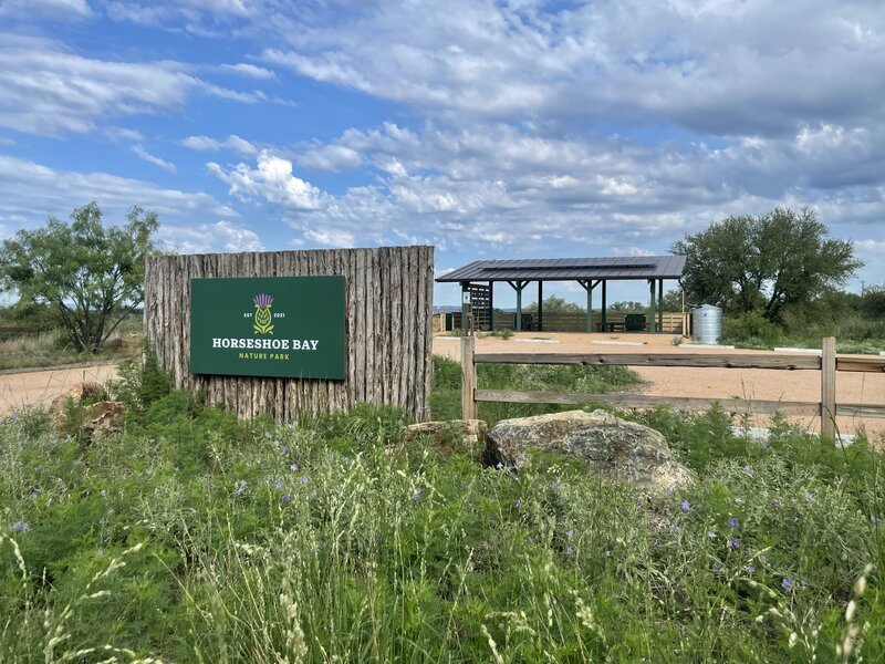 The entry sign and wildlife observation deck at Horseshoe Bay Nature Park.