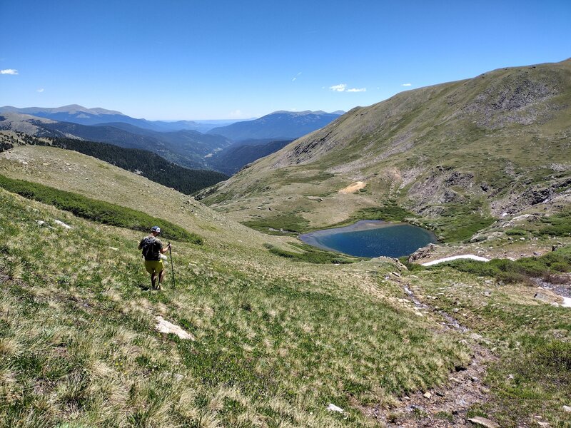 Descending to Gibson Lake. Down valley is Hwy 285 Grant and Bailey looking east.