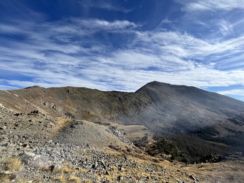 Walking along the long ridgeline toward the summit.