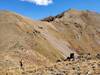 Hiking across the a mellow section of ridge towards Silver Mountain.