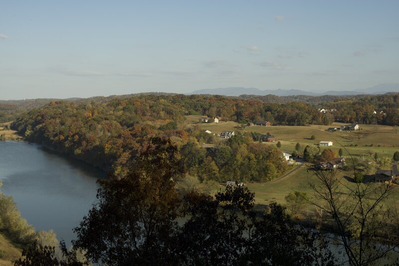 Around the corner, additional views of the French Broad River and surrounding community spread out before you.
