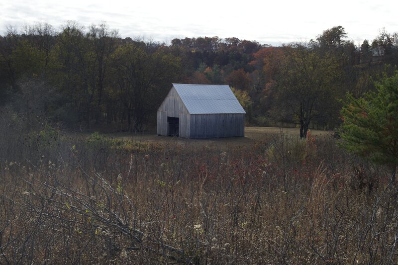 The trail climbs up above the Maple Leaf Barn and offers a different view of it.