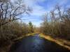 The Sunrise River from the bridge at the northern trailhead.