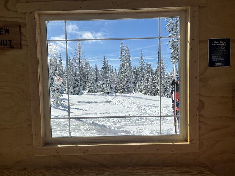 View of the snowscape from inside the Blues Crew Warming Hut.