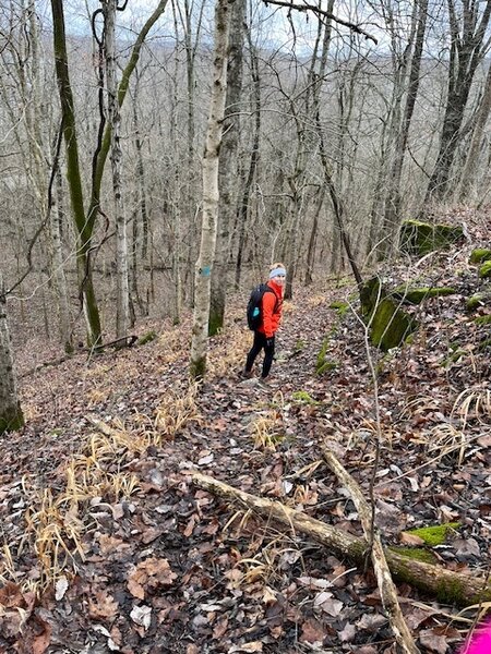 Happy hiker after the rock climb descending the trail toward Otter Creek.