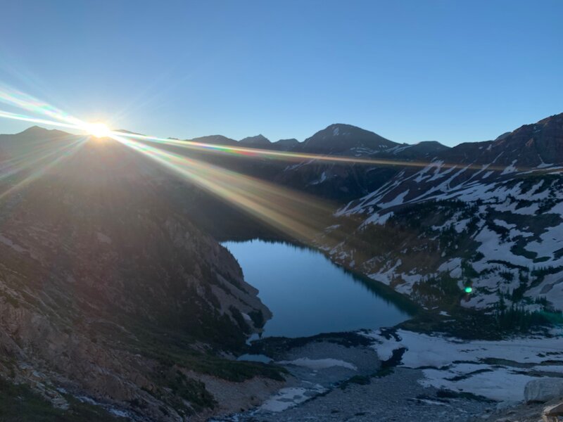 Sunrise looking over Snowmass Lake.