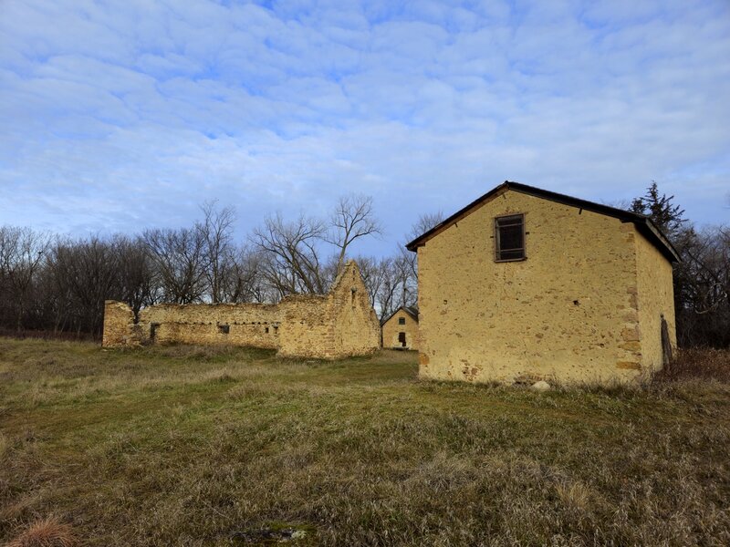 Barn ruins, granary, and chicken coop at Jabs Farm.