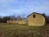 Barn ruins, granary, and chicken coop at Jabs Farm.