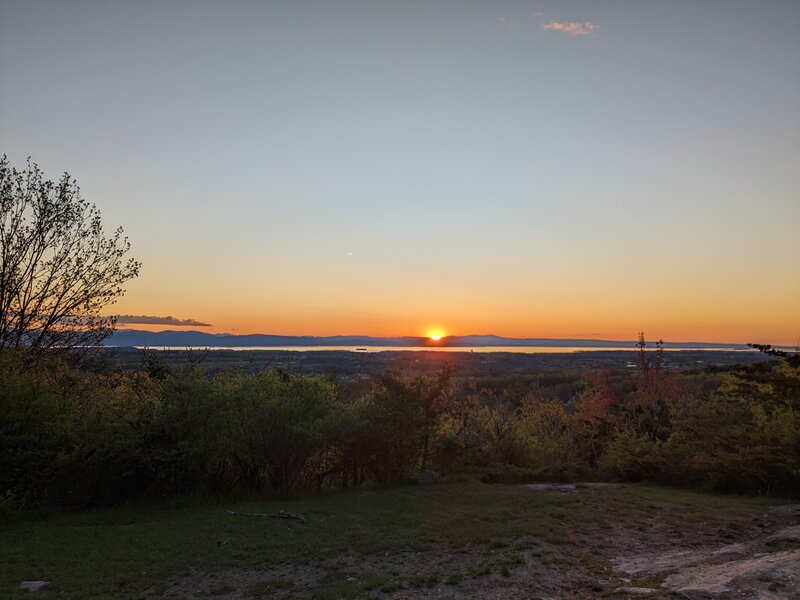 Top of trail, looking at sunset over Lake Champlain