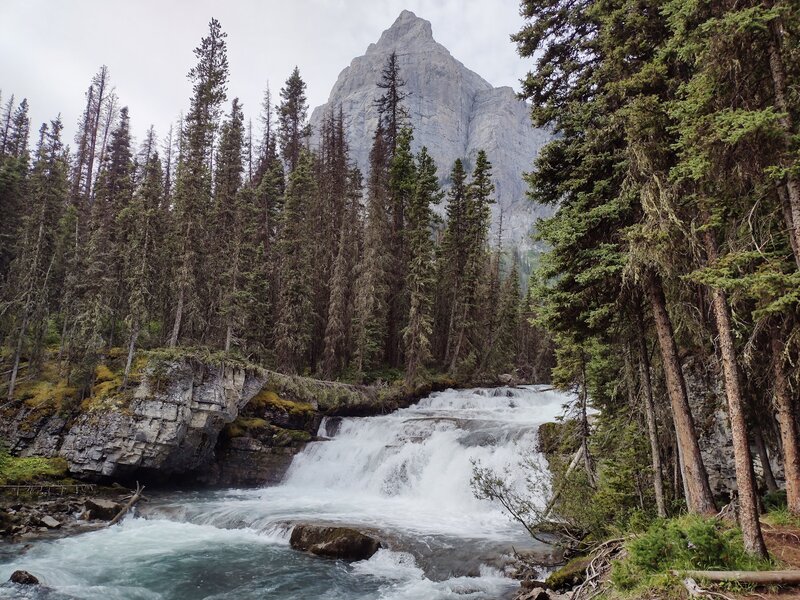 Cascades along Lower Kananaskis Falls, with Mount Lyautey, 9,990 ft., rising up nearby.