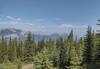 Mt. Indefatigable, 8,760 ft. (left) and (grouped together, center right) Kent Ridge/Mt. Kent, 8,645 ft., Mt. Inflexible, 9,842 ft., and Mt. Lawson, 9,170 ft. Lower Kananaskis Lake (left) is below Mt. Indefatigable.