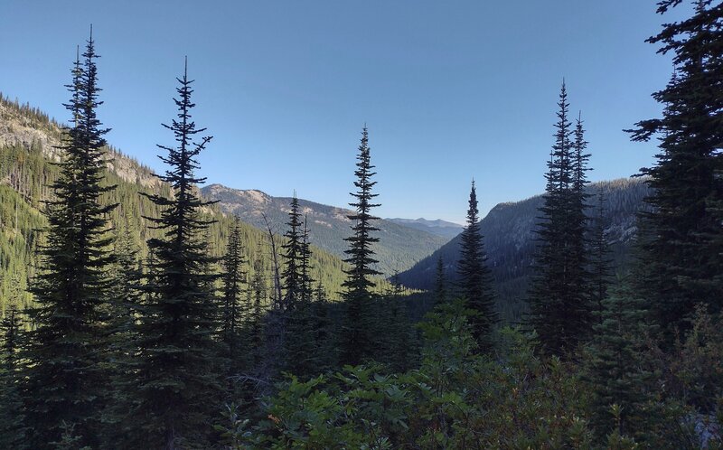 Looking down the Snow Creek valley from high on Snow Lake Trail, from the nearby ridges to the mountains in the distance, on a perfect late August morning.