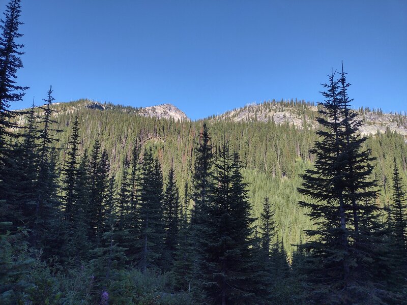 Massive Bottleneck Peak at 6,782 ft. (center left), is nearby to the west, as seen from high on Snow Lake Trail.