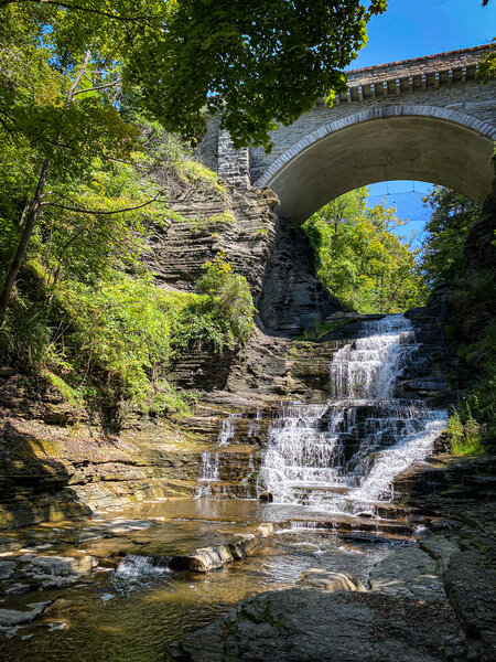 Waterfall underneath College Avenue Stone Arch Bridge, part of Cascadilla Gorge Trail.