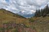 Bastille Mountain, 8,350 ft., Surprise Pass, and Mount Cote, 7,844 ft., are in the distance to the northwest.