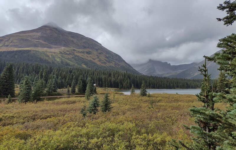 Mt. Ian Monroe, 7,149 ft., (left) with the Kakwa Cabin (left center) at its base. Kakwa Lake is on the right.