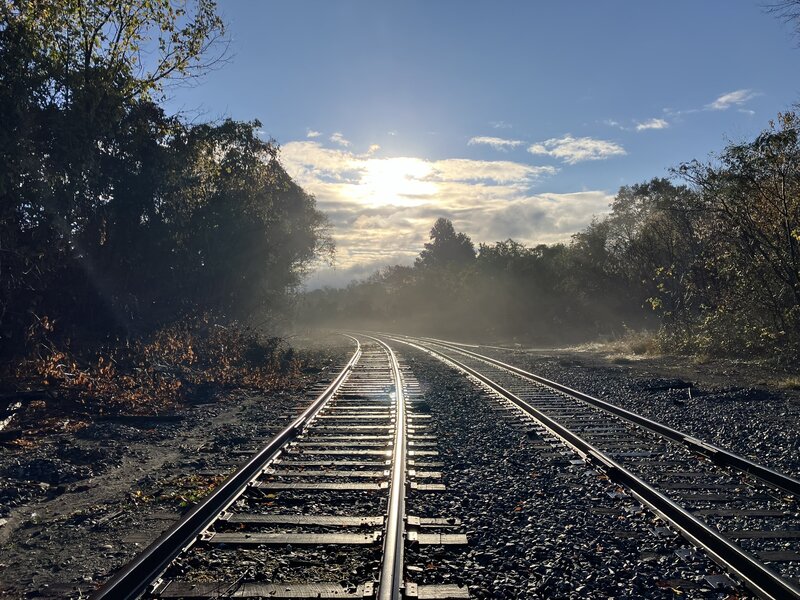 Sunrise over the railroad tracks.