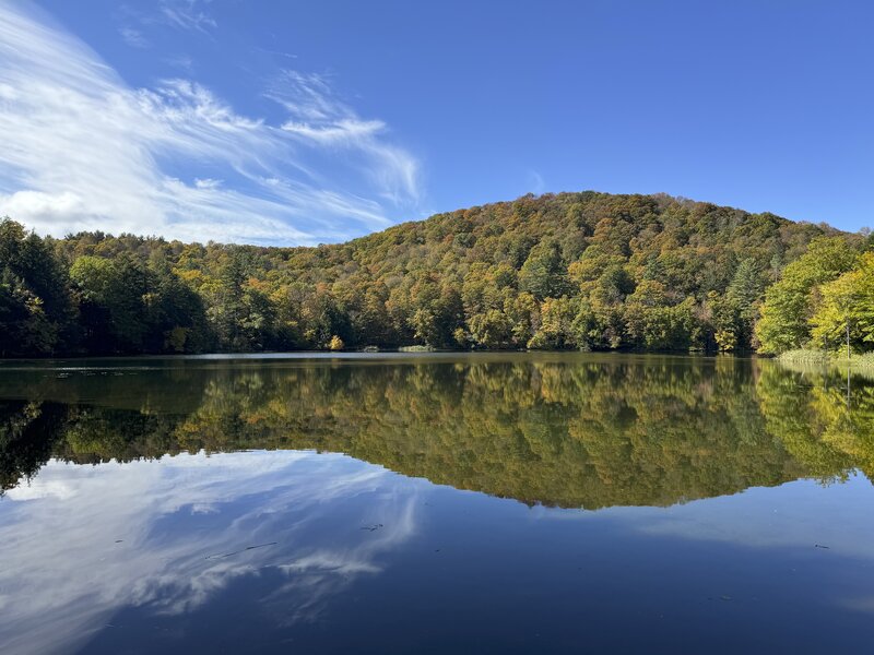 The Pogue can reflect the sky and forest surrounding it. In the fall, the vibrant colors of the trees create stunning views for you to enjoy.