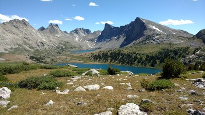 Middle Fork Lake nearby, distant Lee Lake surrounded by rugged peaks (left to right) - unnamed (11,710 ft.), Bailey Peak (12,166 ft.), Nylon Peak (12,392 ft.), Mount Bonneville (12,585 ft.), Pronghorn Peak (12.388 ft.), and Dragon Head Peak (12,205 ft.).