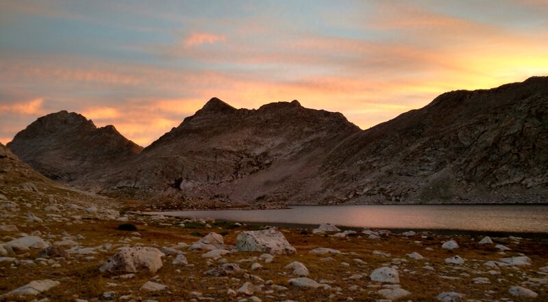 Sunrise at Bewmark Lake. Odyssey Peak, 12,062 ft. (center) on the Continental Divide.