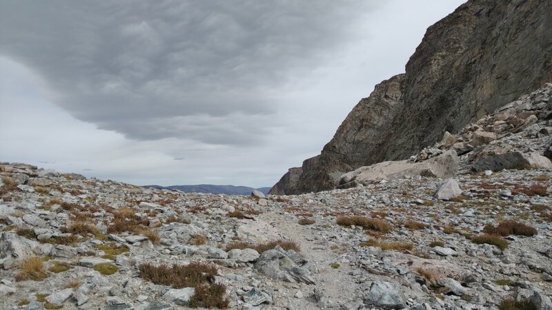 Approaching Photo Pass from the west side of the Continental Divide. The cairn is on the large boulder to the right.